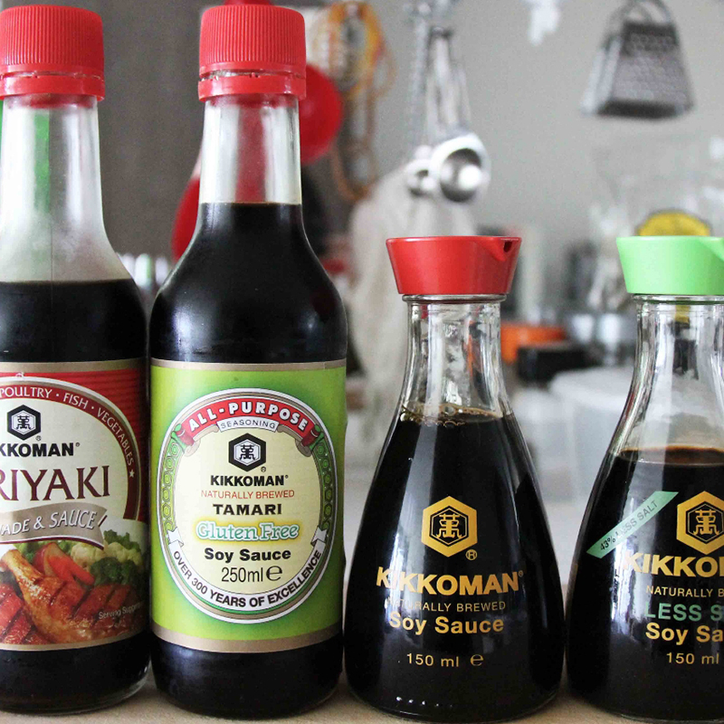 Bottles of Kikkoman sauces in a kitchen
